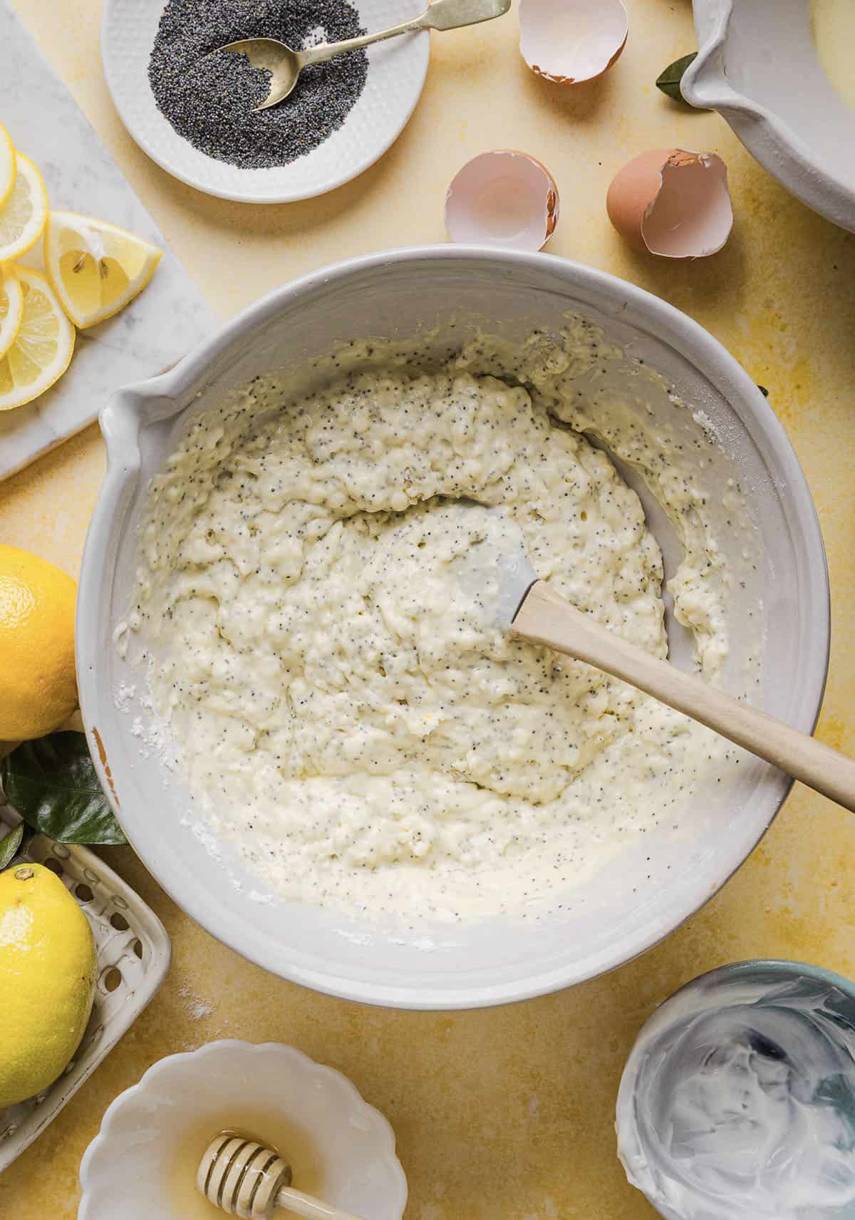 The BEST Healthy Lemon Poppy Seed Bread made with Greek yogurt and honey. Perfectly moist, naturally sweetened, and topped with the most delicious fresh lemon glaze!