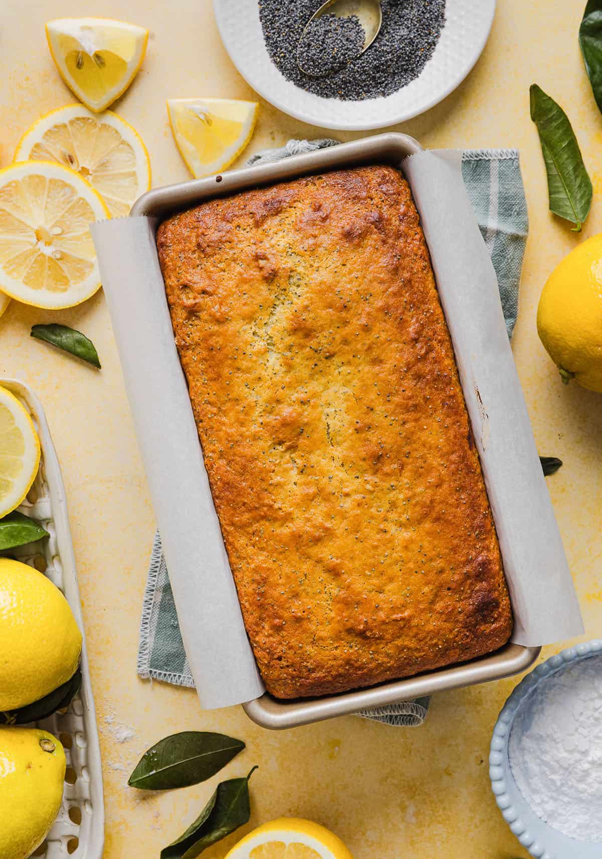 The BEST Healthy Lemon Poppy Seed Bread made with Greek yogurt and honey. Perfectly moist, naturally sweetened, and topped with the most delicious fresh lemon glaze!
