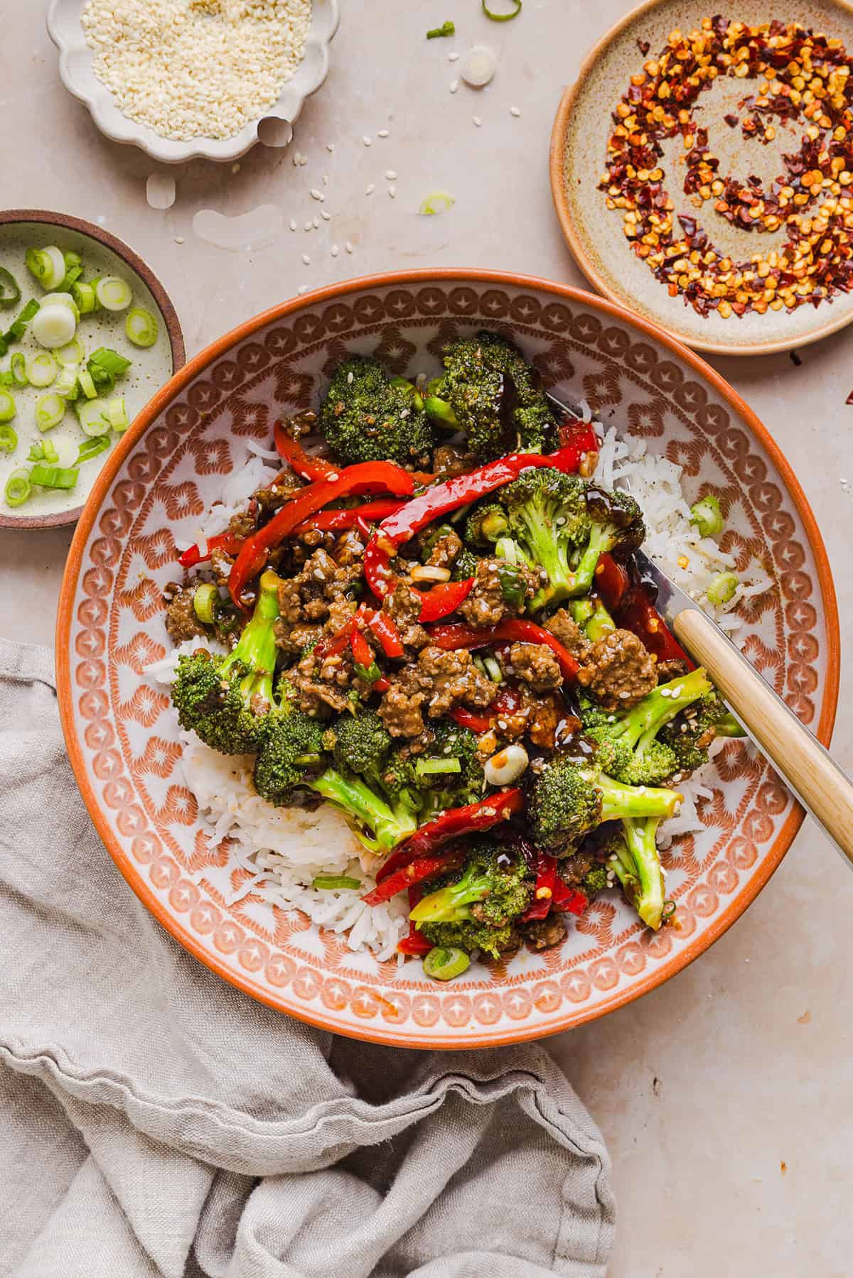 These Healthy Mongolian Ground Beef Bowls are quick, easy, and ready in just 20 minutes! Made with a sweet and savory sauce, this high-protein dinner is perfect for busy weeknights or meal prep.